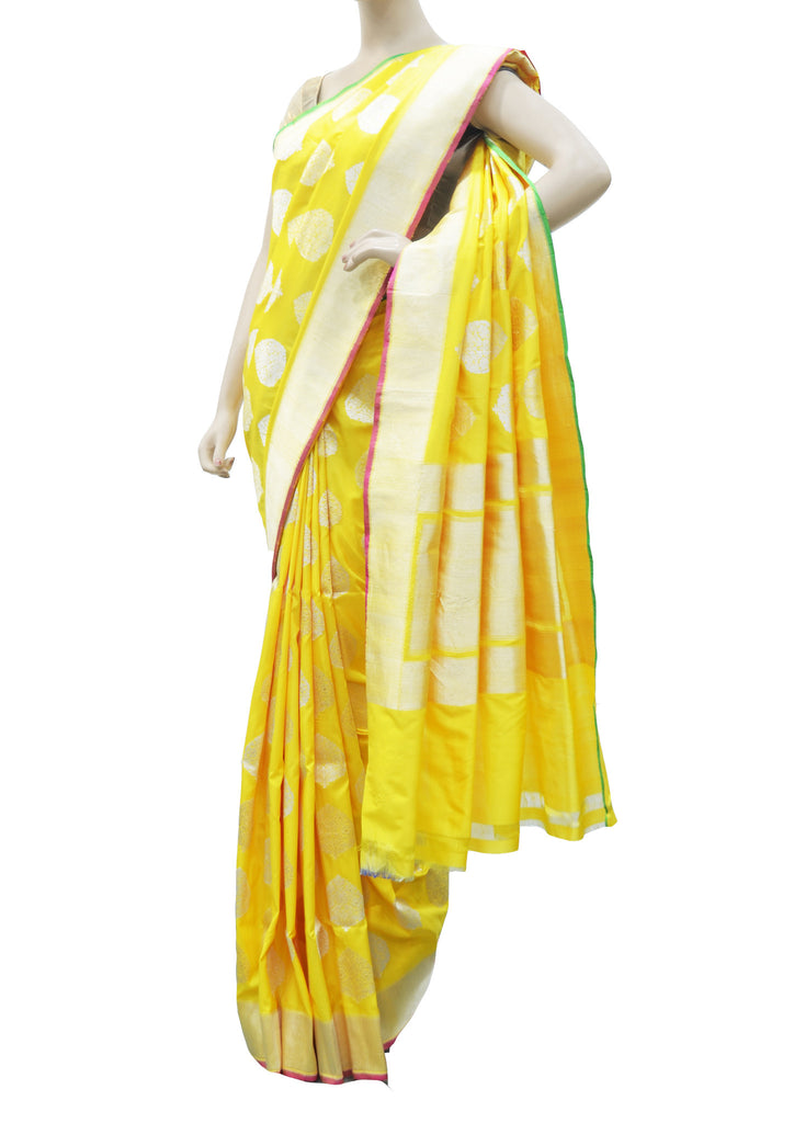 Sizzling Yellow with plain golden border saree