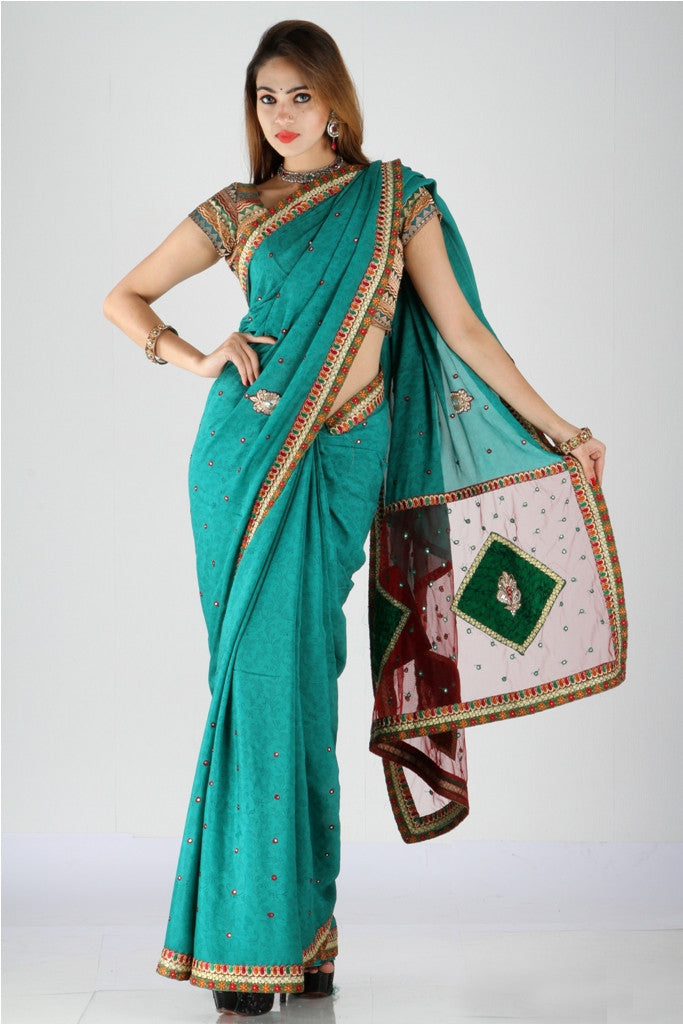 Charming peacock green printed crepe saree
