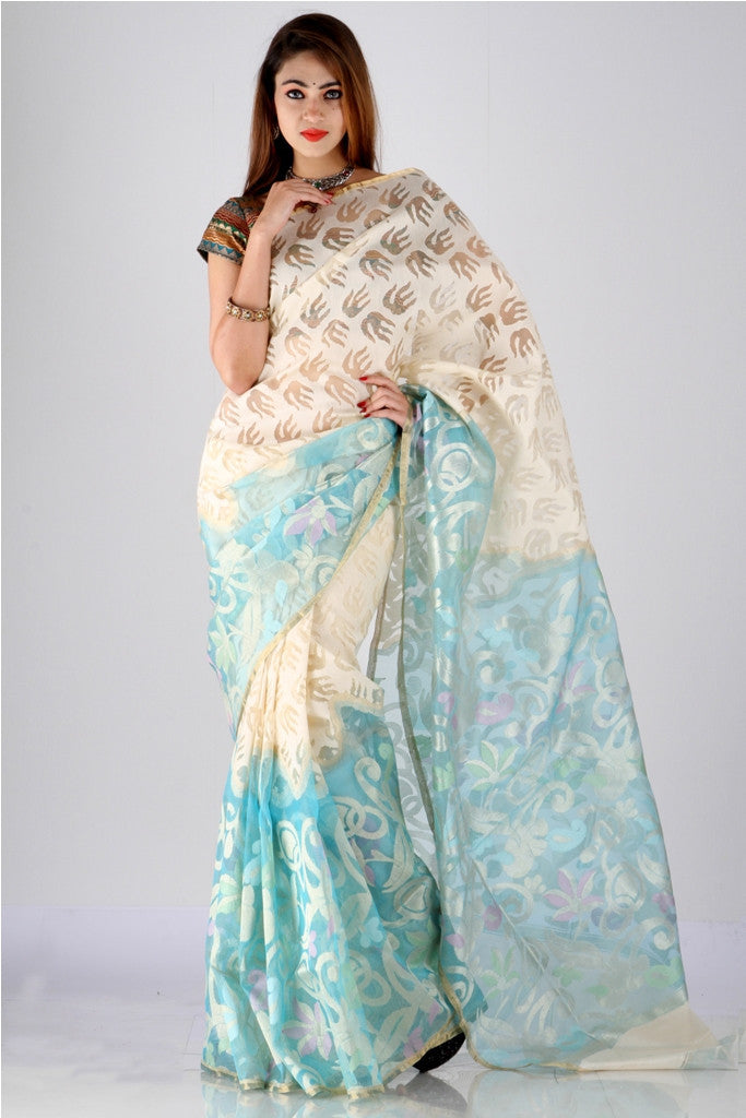 Fascinating beige nad sea green hand loom net saree